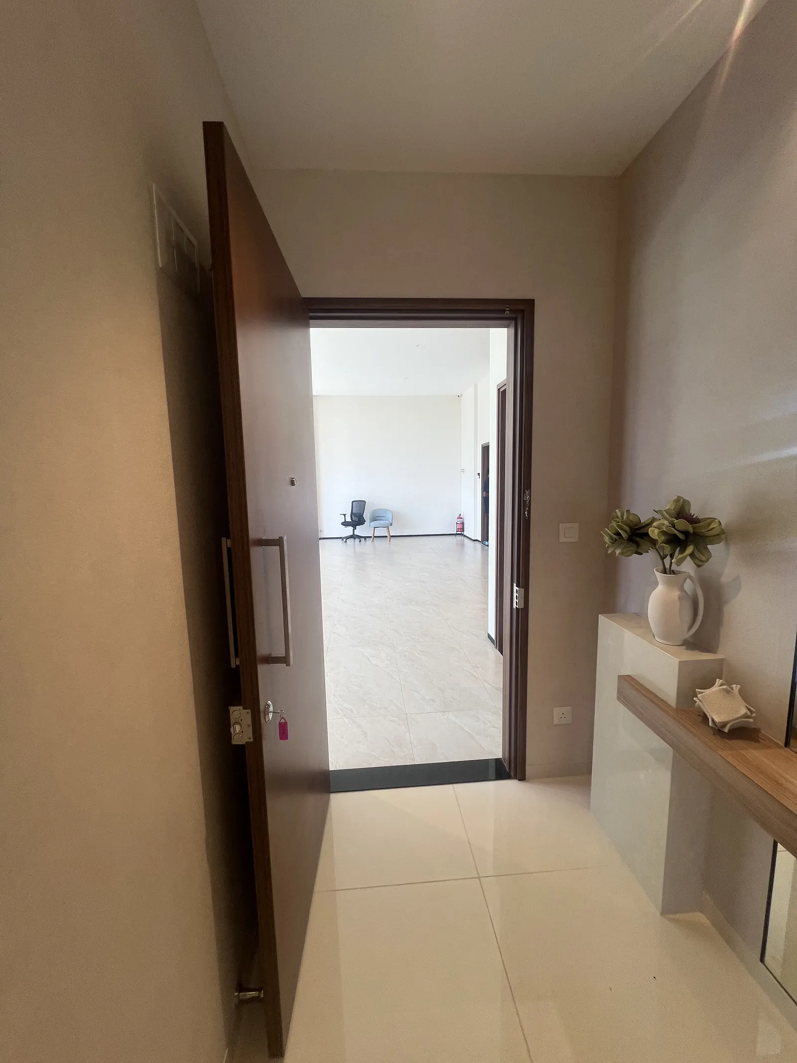Featured Image of Godrej Vanantara 3 BHK (3T) Model Apartment common corridor between units showing inter-unit privacy spacing