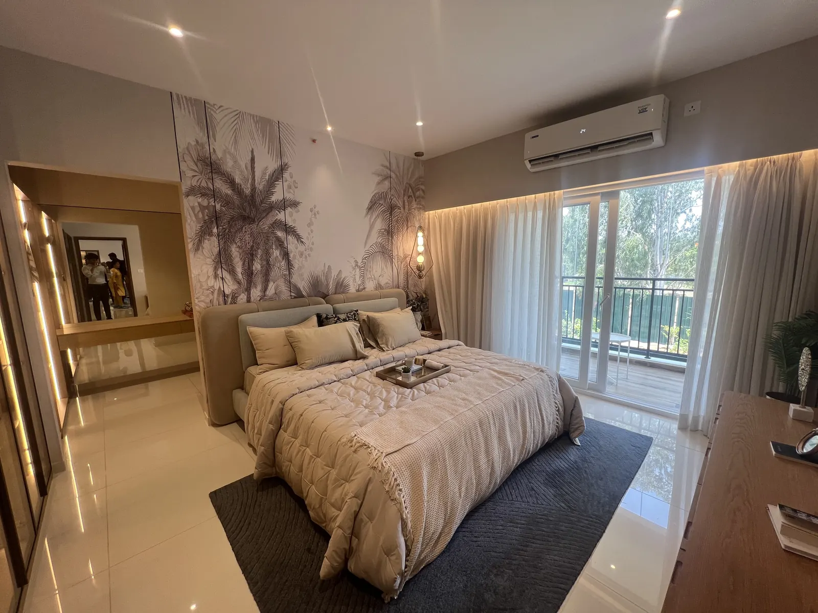 Featured Image of Godrej Vanantara 3 BHK (3T) Model Apartment Master Bedroom with palm-leaf feature wall and balcony