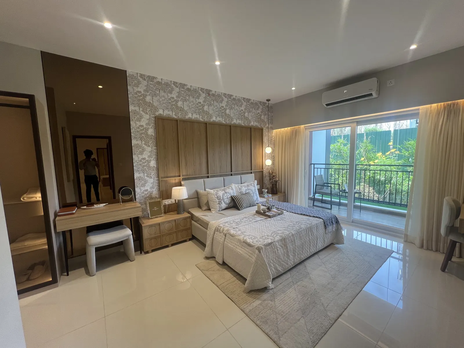 Featured Image of Godrej Vanantara 4.5 BHK Model Apartment Master Bedroom with floral feature wall and balcony