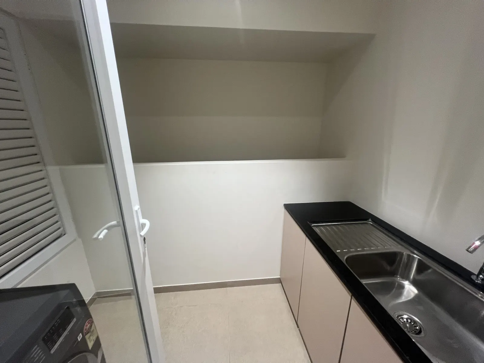 Godrej Vanantara 4.5 BHK Apartment Floor Plan - actual utility room photo with washing machine