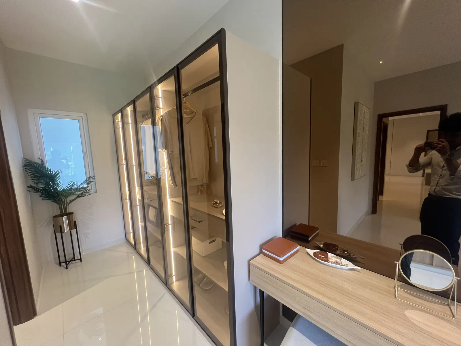 Featured Image of Godrej Vanantara 4.5 BHK Model Apartment Walk-in Wardrobe with glass-front cabinetry